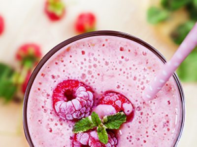 Fruit smoothie, milk shake made of raspberry, top close-up view